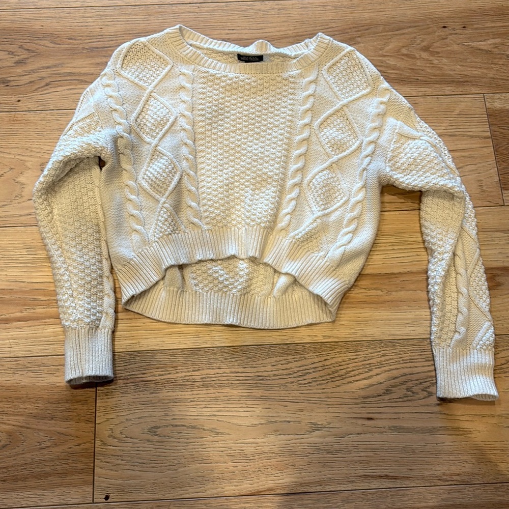 Knitted white sweater
